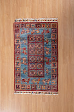 Load image into Gallery viewer, Tribal Horsemen Blue Afghan Ziegler Rug
