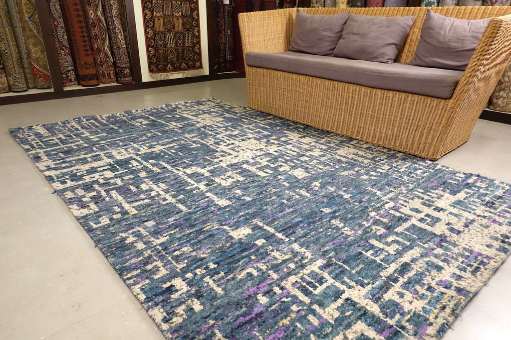A 5 by 8 feet modern rug.