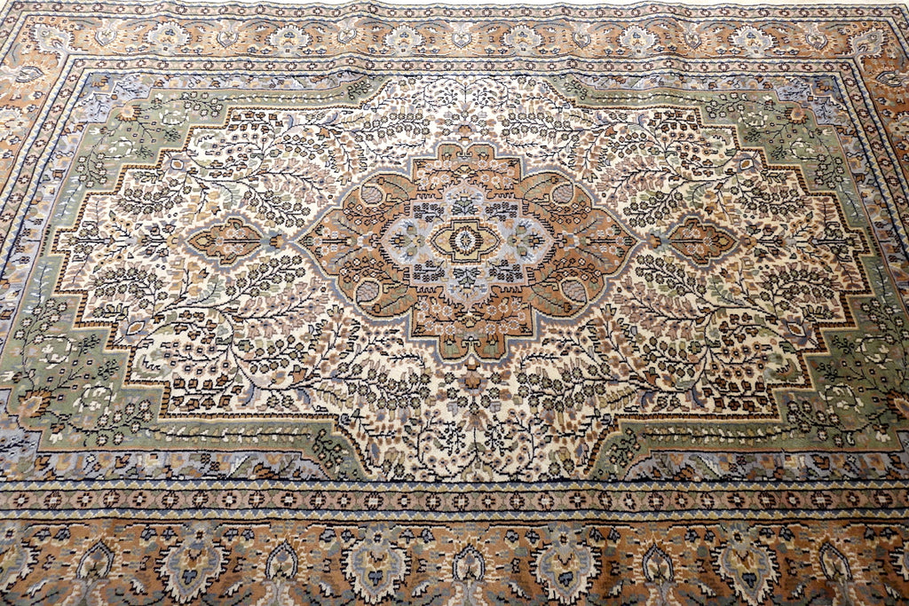 A 6 feet by 9 feet Kashan design central Indian wool carpet/rug.