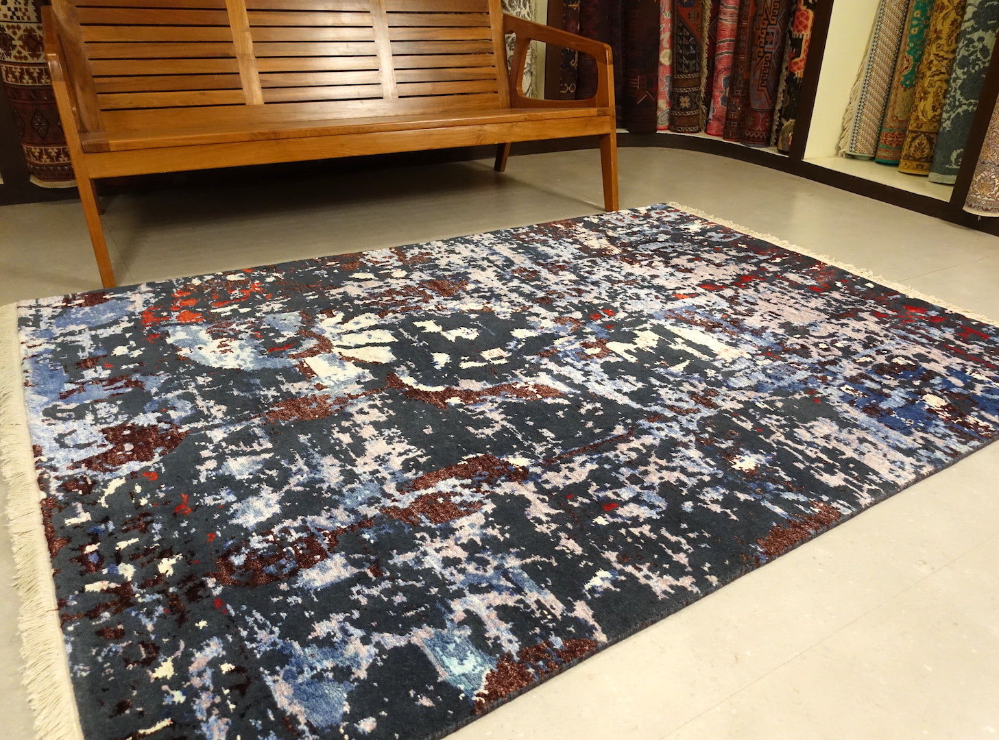 Modern Rugs/Carpet With Abstract Design. Predominantly with Blue and Green Colors. The rug is 5 feet by 7 feet. 