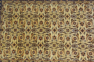 It is a 4 feet by 6 feet Indian wool rug with yellow, dark blue, rust and cherry colours.