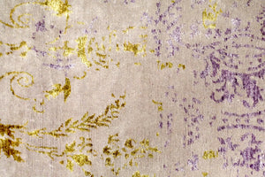 A 4 feet by 6 feet rug with an erased design in light purple as a based with sprinkle of yellow and darker purple.