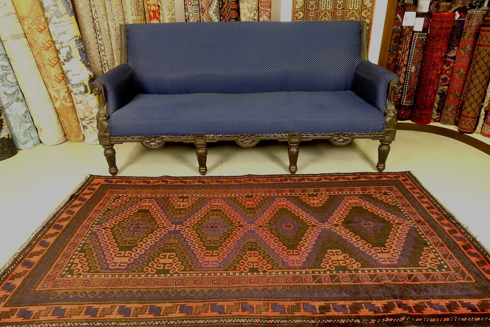 A 4 by 7 feet balochi wool rug.